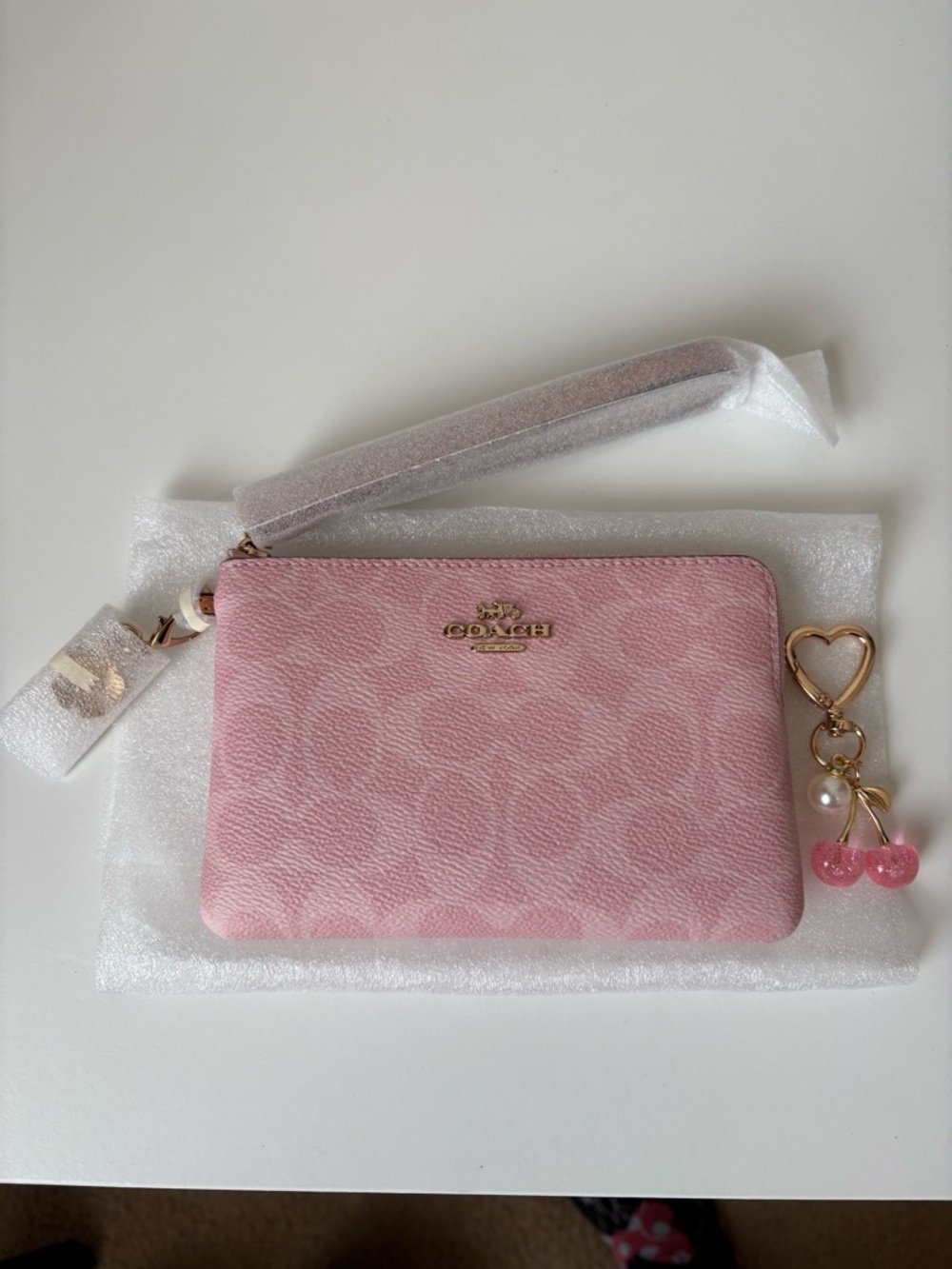 Coach Pink Powder Signature Zip Wristlet with Cherry Charm